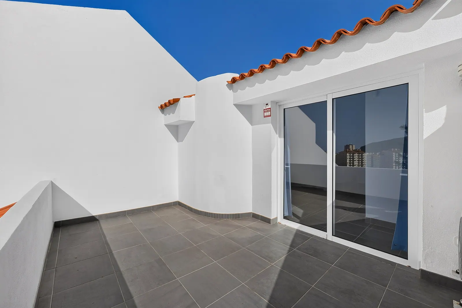 Terraza superior con acceso al dormitorio